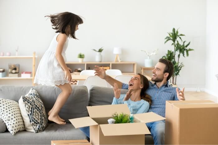 Child jumping on sofa