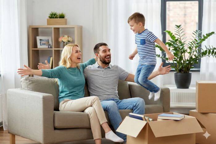 Child jumping on sofa