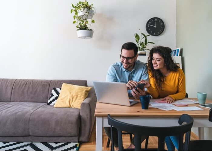 Couple looking at laptop