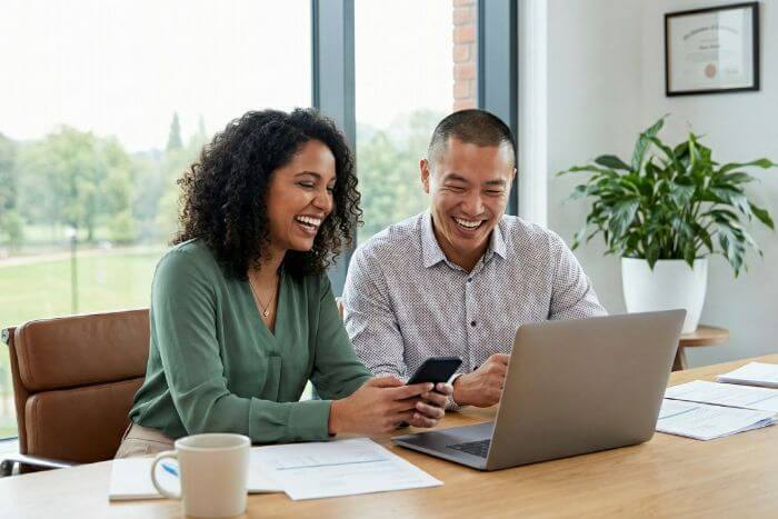 Couple looking at laptop