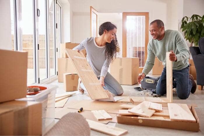 Couple assembling flat-pack